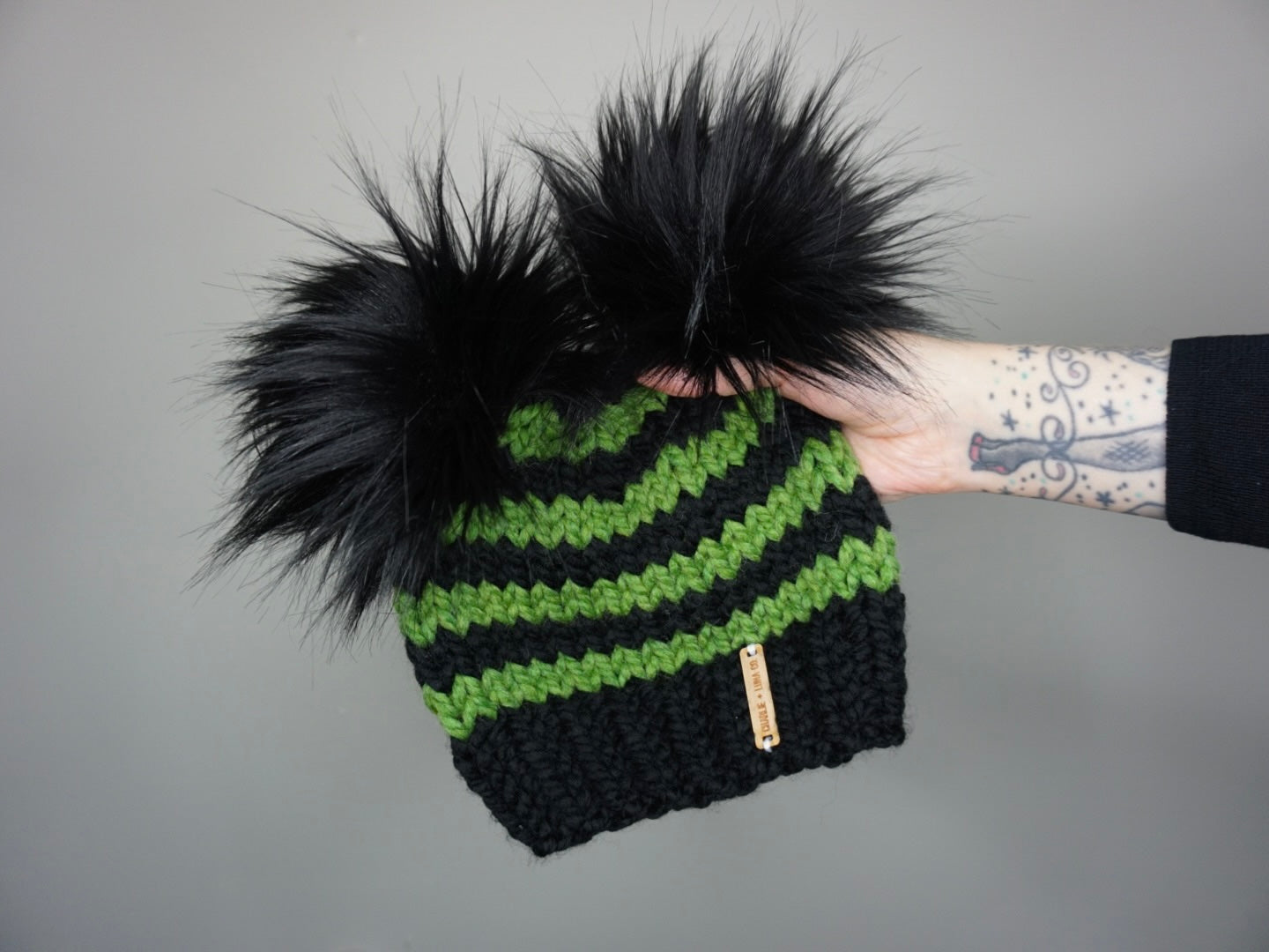 Kids Halloween Stripe Double Pom Beanie in Green and Black