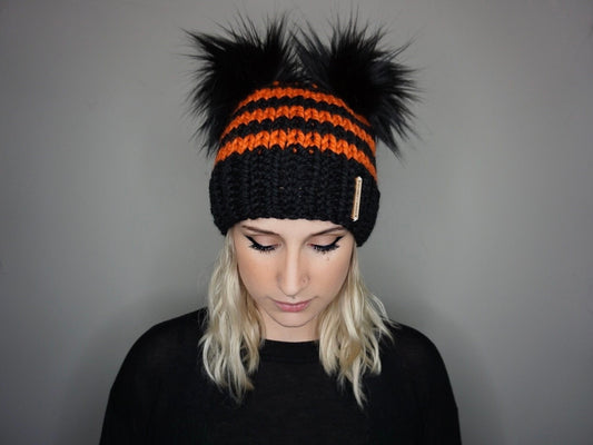 The Halloween Stripe Double Pom Beanie in Orange and Black