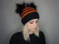 The Halloween Stripe Double Pom Beanie in Orange and Black